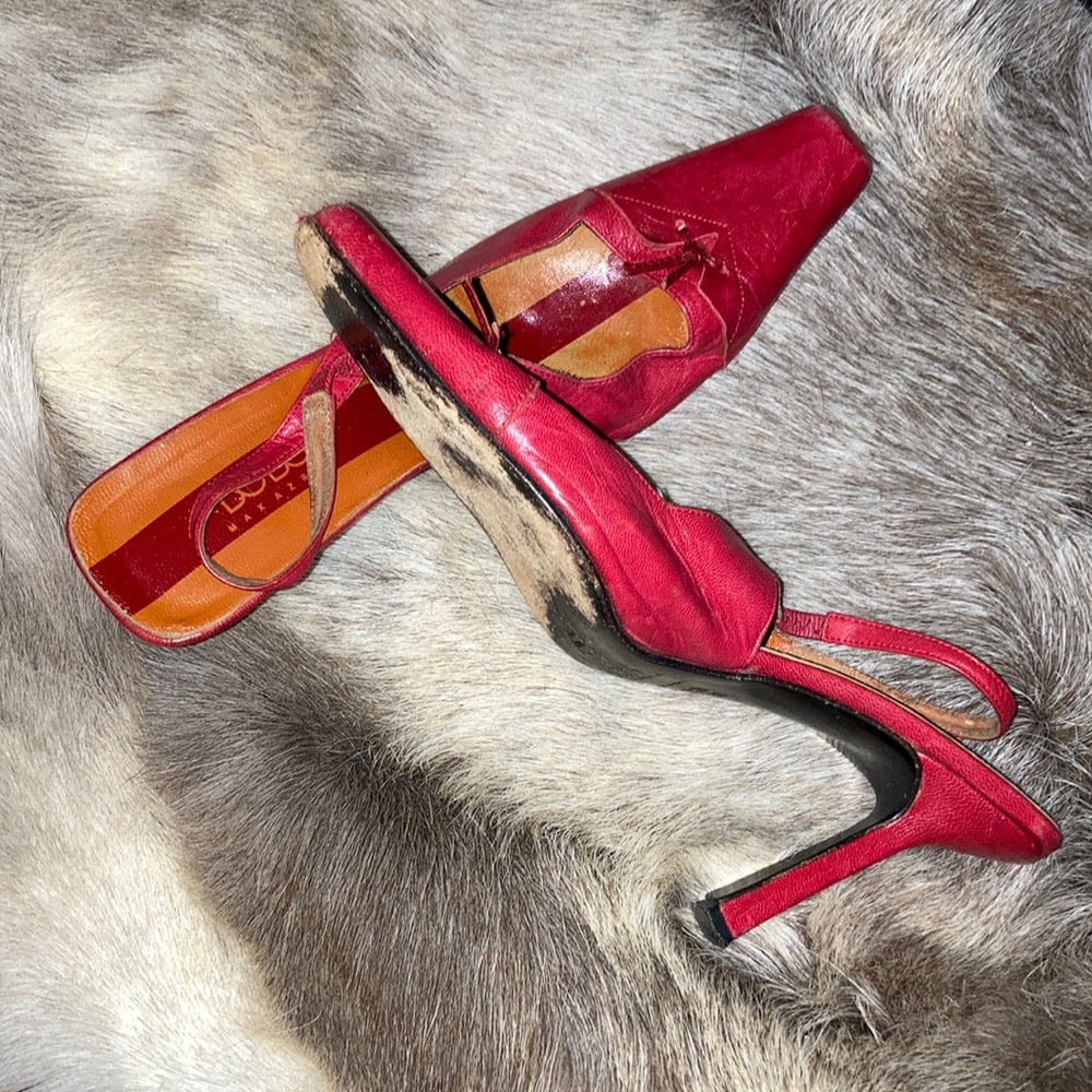 Red leather 4” strapped heel with tassel on top